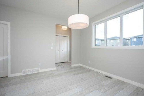 141 Dawson Wharf View, Chestermere, AB - Indoor Photo Showing Other Room