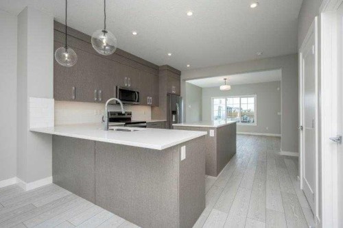 141 Dawson Wharf View, Chestermere, AB - Indoor Photo Showing Kitchen