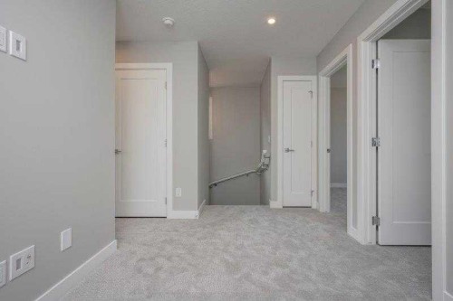 141 Dawson Wharf View, Chestermere, AB - Indoor Photo Showing Other Room