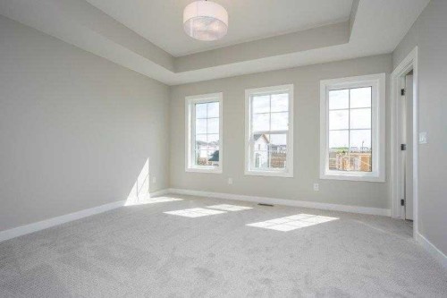 141 Dawson Wharf View, Chestermere, AB - Indoor Photo Showing Other Room