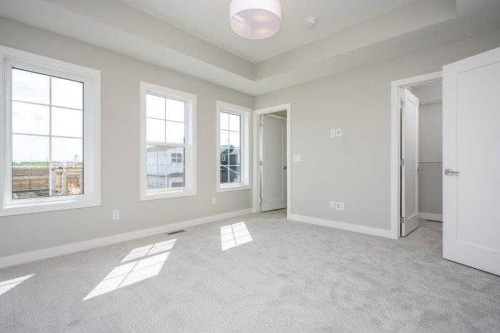 141 Dawson Wharf View, Chestermere, AB - Indoor Photo Showing Other Room