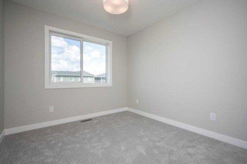 141 Dawson Wharf View, Chestermere, AB - Indoor Photo Showing Other Room