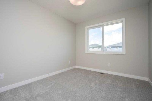 141 Dawson Wharf View, Chestermere, AB - Indoor Photo Showing Other Room
