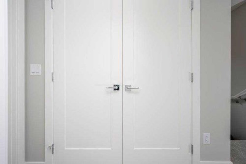 141 Dawson Wharf View, Chestermere, AB - Indoor Photo Showing Other Room