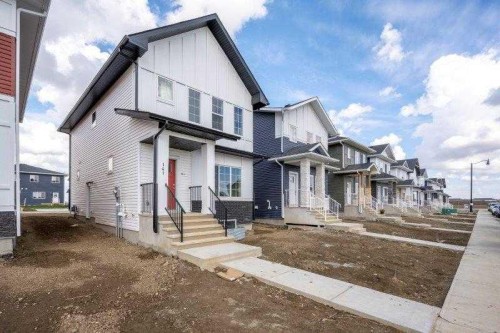 141 Dawson Wharf View, Chestermere, AB - Outdoor With Facade