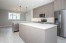 141 Dawson Wharf View, Chestermere, AB  - Indoor Photo Showing Kitchen With Upgraded Kitchen 