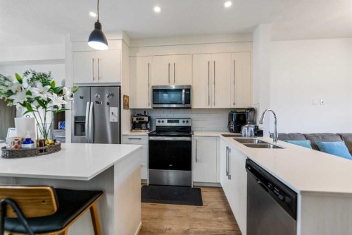 1209 Cornerstone Street Ne, Calgary, AB - Indoor Photo Showing Kitchen With Double Sink