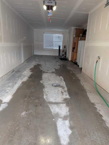 1209 Cornerstone Street Ne, Calgary, AB - Indoor Photo Showing Garage