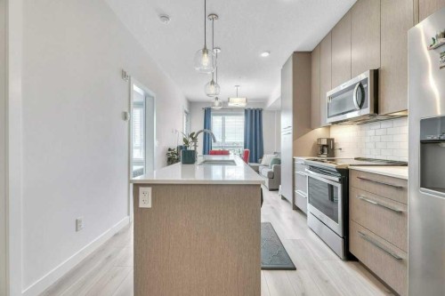 1321-76 Cornerstone Passage Ne, Calgary, AB - Indoor Photo Showing Kitchen With Upgraded Kitchen