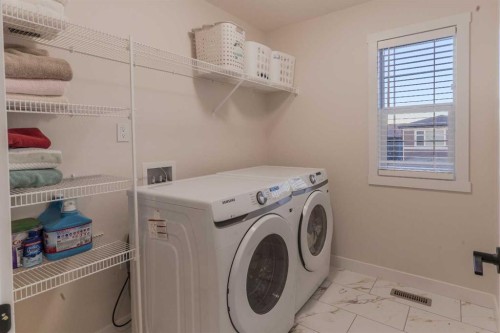 169 Verity Manor Sw, Calgary, AB - Indoor Photo Showing Laundry Room