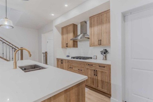 169 Verity Manor Sw, Calgary, AB - Indoor Photo Showing Kitchen With Double Sink