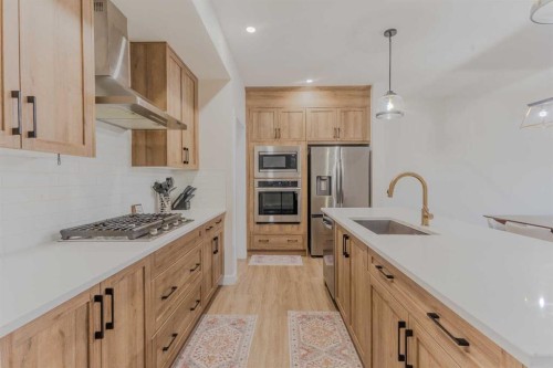 169 Verity Manor Sw, Calgary, AB - Indoor Photo Showing Kitchen With Upgraded Kitchen