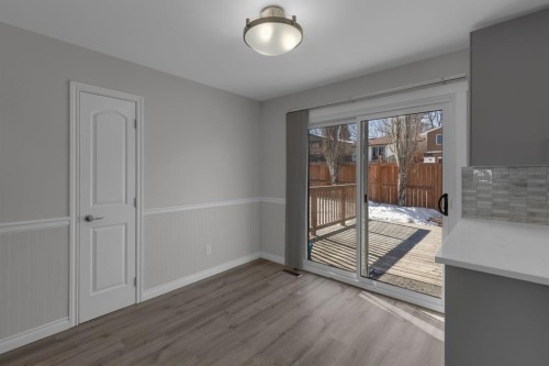 27 Berwick Place Nw, Calgary, AB - Indoor Photo Showing Other Room