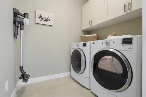 26 Cranbrook Villas Se, Calgary, AB - Indoor Photo Showing Laundry Room