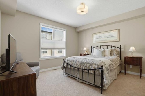 26 Cranbrook Villas Se, Calgary, AB - Indoor Photo Showing Bedroom