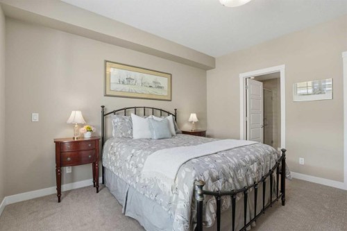 26 Cranbrook Villas Se, Calgary, AB - Indoor Photo Showing Bedroom