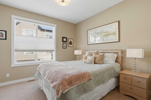 26 Cranbrook Villas Se, Calgary, AB - Indoor Photo Showing Bedroom
