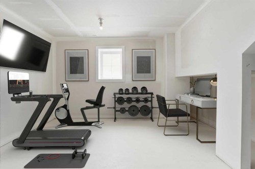 26 Cranbrook Villas Se, Calgary, AB - Indoor Photo Showing Gym Room