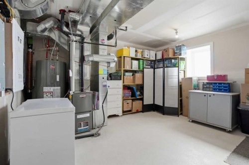 26 Cranbrook Villas Se, Calgary, AB - Indoor Photo Showing Laundry Room