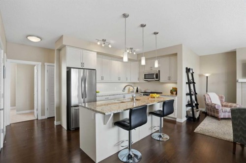 26 Cranbrook Villas Se, Calgary, AB - Indoor Photo Showing Kitchen With Stainless Steel Kitchen With Upgraded Kitchen