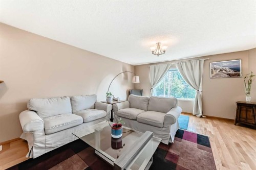170 Shawbrooke Green Sw, Calgary, AB - Indoor Photo Showing Living Room