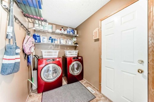 170 Shawbrooke Green Sw, Calgary, AB - Indoor Photo Showing Laundry Room