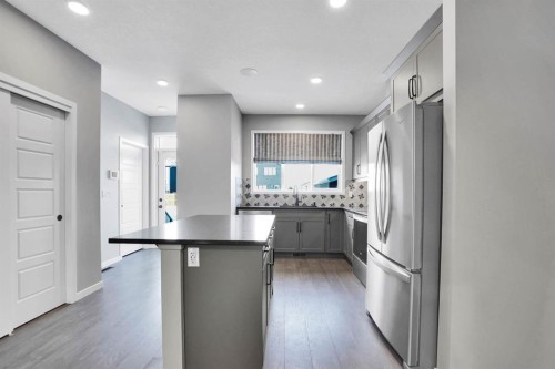 173 Setonstone Green Se, Calgary, AB - Indoor Photo Showing Kitchen With Stainless Steel Kitchen