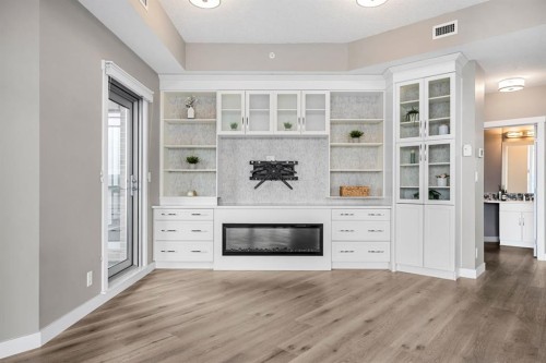 1205-32 Varsity Estates Circle Nw, Calgary, AB - Indoor Photo Showing Other Room With Fireplace