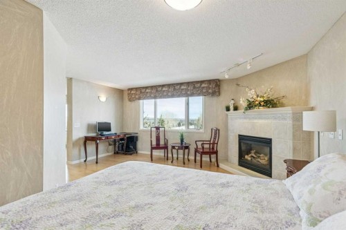22 Valley Creek Road Nw, Calgary, AB - Indoor With Fireplace