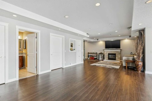 22 Valley Creek Road Nw, Calgary, AB - Indoor Photo Showing Living Room With Fireplace