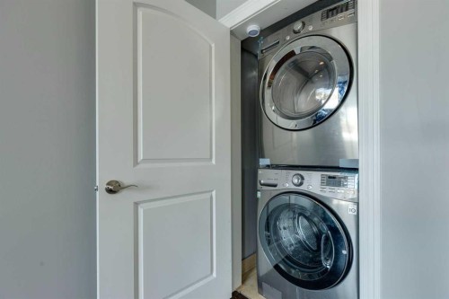 22 Valley Creek Road Nw, Calgary, AB - Indoor Photo Showing Laundry Room