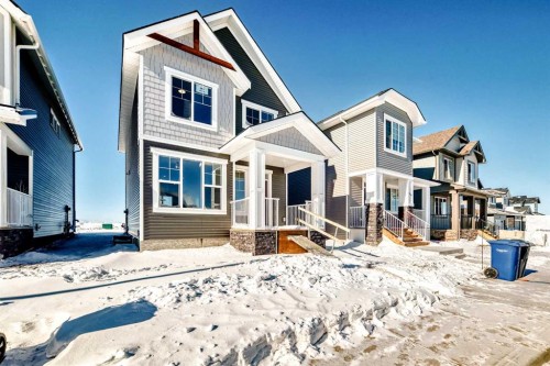 354 Ellen Park, Crossfield, AB - Outdoor With Facade