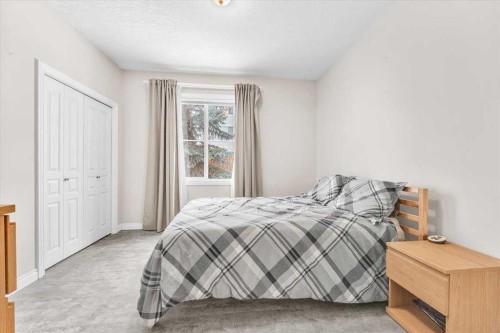 133 Tucker Circle, Okotoks, AB - Indoor Photo Showing Bedroom