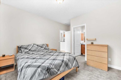 133 Tucker Circle, Okotoks, AB - Indoor Photo Showing Bedroom