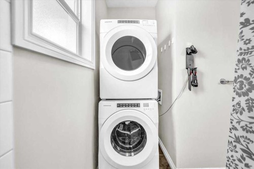 133 Tucker Circle, Okotoks, AB - Indoor Photo Showing Laundry Room