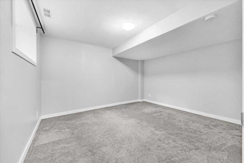 133 Tucker Circle, Okotoks, AB - Indoor Photo Showing Other Room