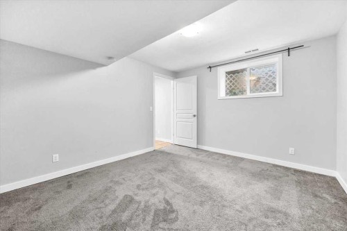 133 Tucker Circle, Okotoks, AB - Indoor Photo Showing Other Room