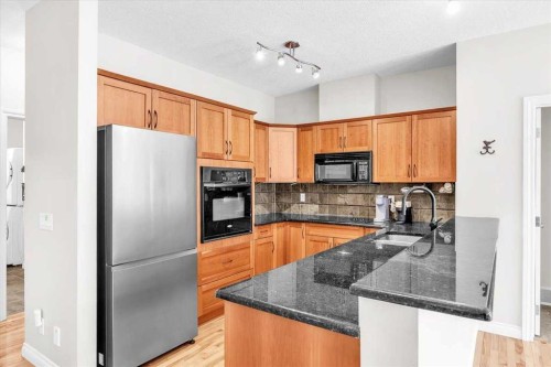 133 Tucker Circle, Okotoks, AB - Indoor Photo Showing Kitchen
