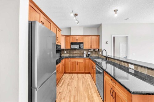 133 Tucker Circle, Okotoks, AB - Indoor Photo Showing Kitchen