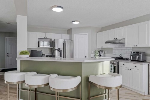 67 Silver Springs Way Nw, Airdrie, AB - Indoor Photo Showing Kitchen