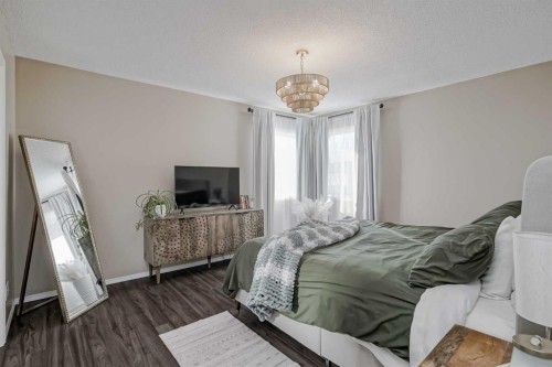 67 Silver Springs Way Nw, Airdrie, AB - Indoor Photo Showing Bedroom