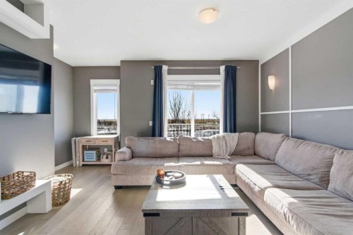 33-111 Rainbow Falls Gate, Chestermere, AB - Indoor Photo Showing Living Room