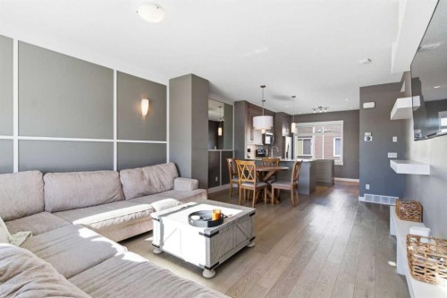 33-111 Rainbow Falls Gate, Chestermere, AB - Indoor Photo Showing Living Room