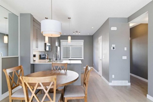 33-111 Rainbow Falls Gate, Chestermere, AB - Indoor Photo Showing Dining Room