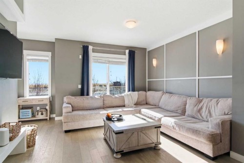 33-111 Rainbow Falls Gate, Chestermere, AB - Indoor Photo Showing Living Room