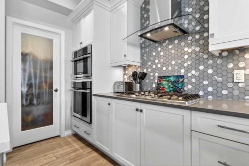 142 Masters Common Se, Calgary, AB - Indoor Photo Showing Kitchen With Upgraded Kitchen