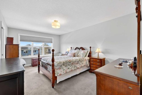142 Masters Common Se, Calgary, AB - Indoor Photo Showing Bedroom