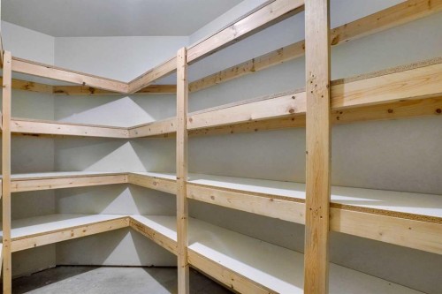 27-925 Imperial Drive, Diamond Valley, AB - Indoor With Storage