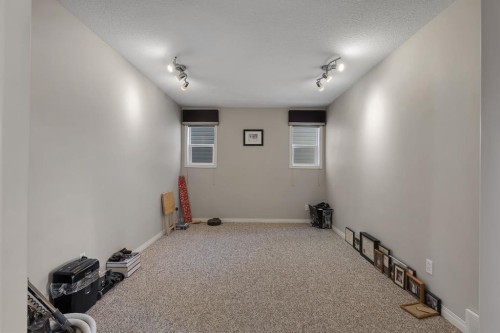 23 Evansbrooke Manor Nw, Calgary, AB - Indoor Photo Showing Other Room
