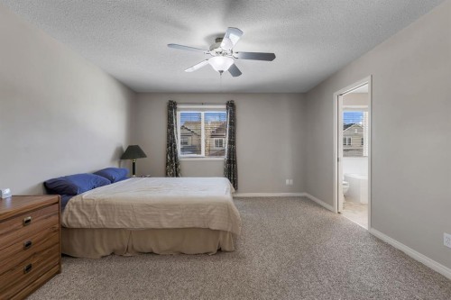 23 Evansbrooke Manor Nw, Calgary, AB - Indoor Photo Showing Bedroom